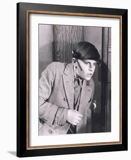 Boy Eavesdropping at Door-null-Framed Photo