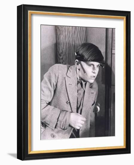 Boy Eavesdropping at Door-null-Framed Photo