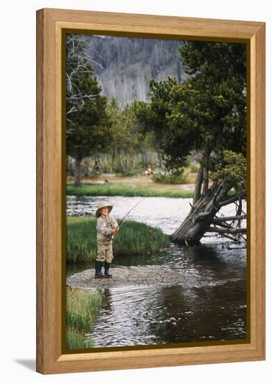 Boy Fishing at Firehole River, Wyoming, USA-Scott T. Smith-Framed Premier Image Canvas