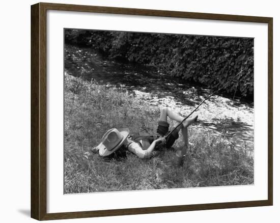 Boy Fishing with Hat Over Face-Bettmann-Framed Photographic Print