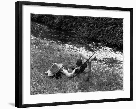 Boy Fishing with Hat Over Face-Bettmann-Framed Photographic Print