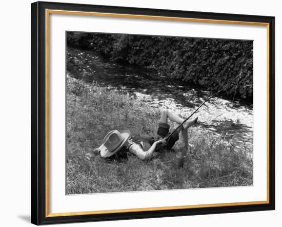 Boy Fishing with Hat Over Face-Bettmann-Framed Photographic Print