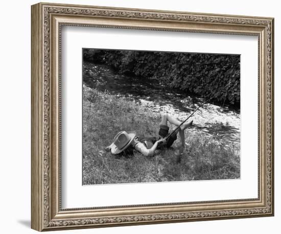 Boy Fishing with Hat Over Face-Bettmann-Framed Photographic Print