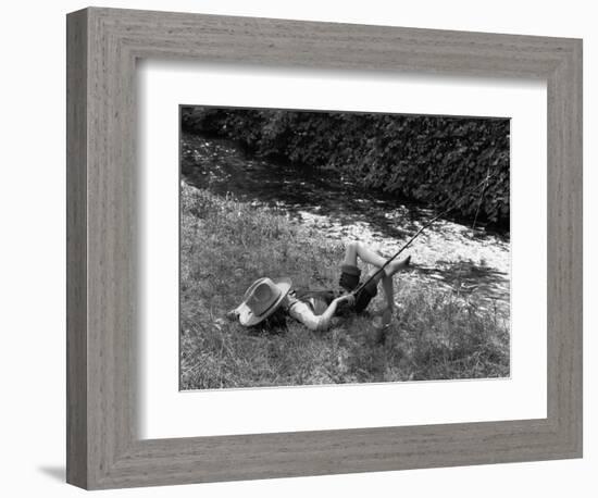 Boy Fishing with Hat Over Face-Bettmann-Framed Photographic Print