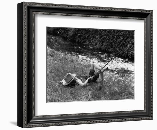 Boy Fishing with Hat Over Face-Bettmann-Framed Photographic Print