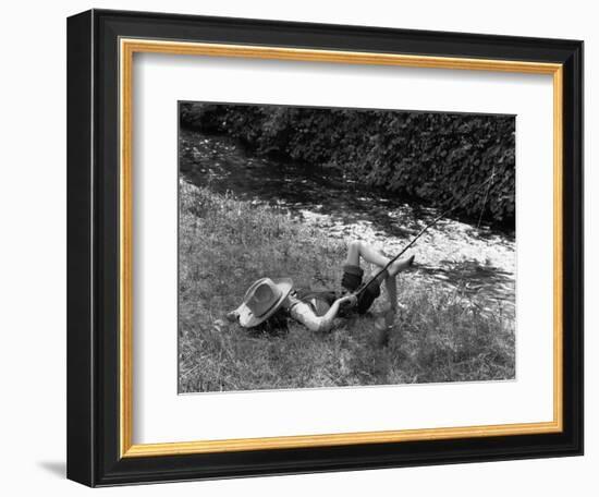 Boy Fishing with Hat Over Face-Bettmann-Framed Photographic Print