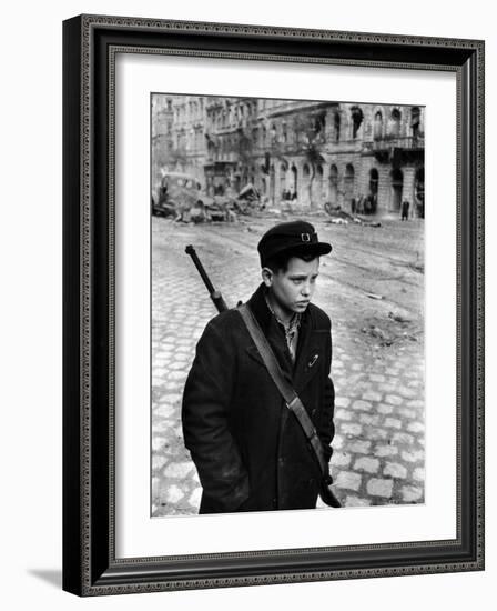 Boy Freedom Fighter Carrying Rifle During Hungarian Revolution Against Soviet Backed Government-Michael Rougier-Framed Photographic Print