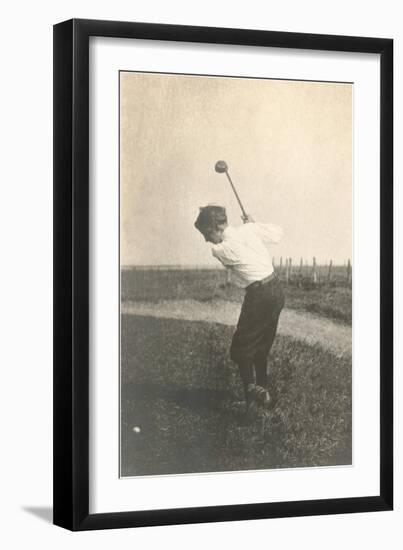 Boy Golfing in Field-null-Framed Art Print