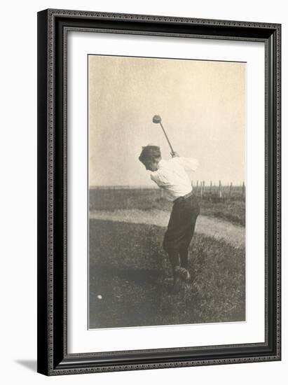 Boy Golfing in Field-null-Framed Art Print