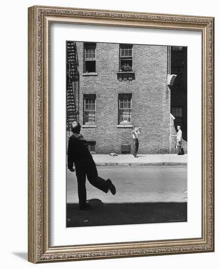 Boy Hitting Ball During Game of Stickball-Ralph Morse-Framed Photographic Print