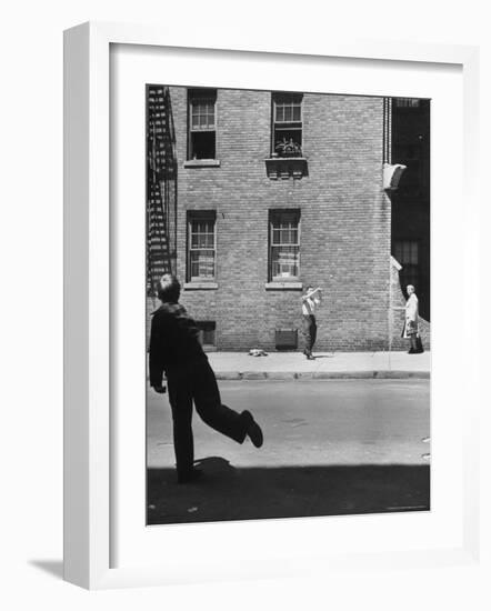 Boy Hitting Ball During Game of Stickball-Ralph Morse-Framed Photographic Print