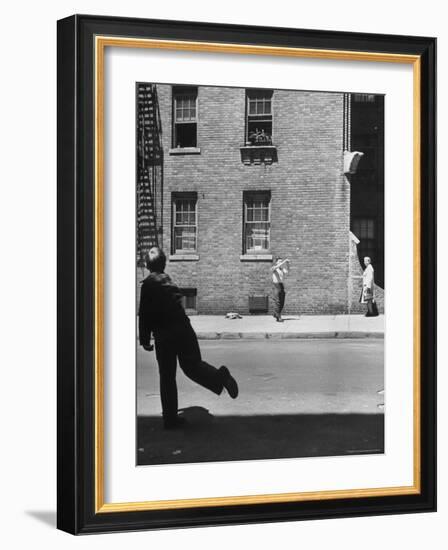 Boy Hitting Ball During Game of Stickball-Ralph Morse-Framed Photographic Print