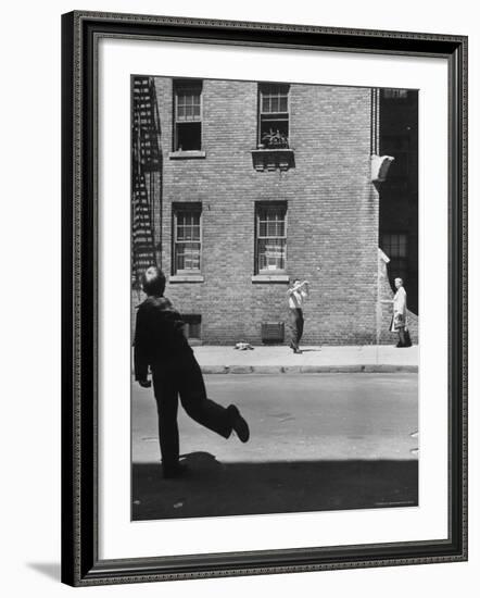 Boy Hitting Ball During Game of Stickball-Ralph Morse-Framed Photographic Print