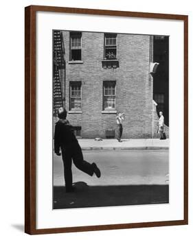 Boy Hitting Ball During Game of Stickball-Ralph Morse-Framed Photographic Print