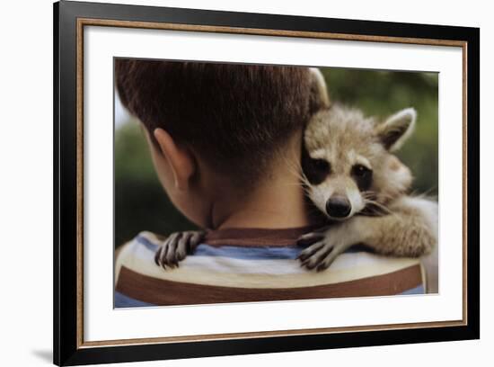 Boy Holding a Raccoon-William P. Gottlieb-Framed Photographic Print