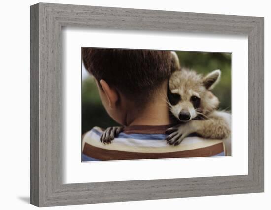 Boy Holding a Raccoon-William P. Gottlieb-Framed Photographic Print