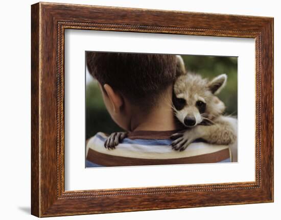 Boy Holding a Raccoon-William P. Gottlieb-Framed Photographic Print