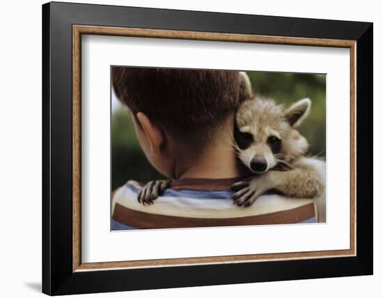 Boy Holding a Raccoon-William P. Gottlieb-Framed Photographic Print