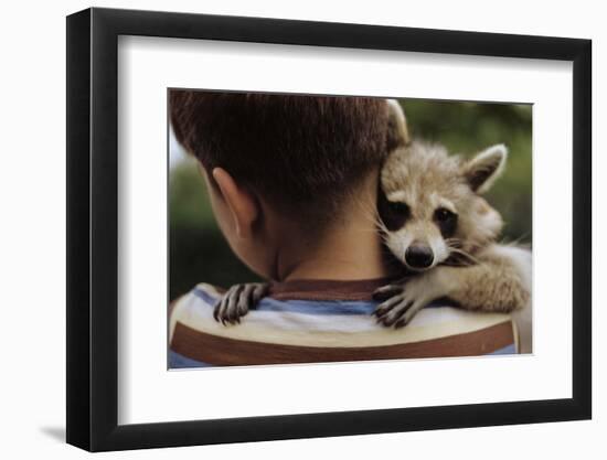 Boy Holding a Raccoon-William P. Gottlieb-Framed Photographic Print