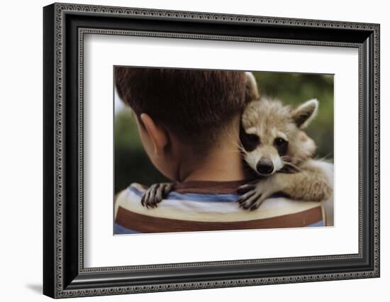 Boy Holding a Raccoon-William P. Gottlieb-Framed Photographic Print