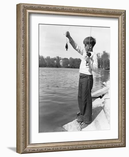 Boy Holding a Small Fish-Philip Gendreau-Framed Photographic Print