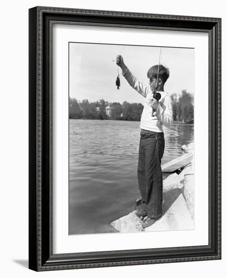 Boy Holding a Small Fish-Philip Gendreau-Framed Photographic Print