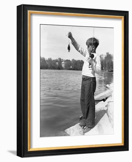 Boy Holding a Small Fish-Philip Gendreau-Framed Photographic Print