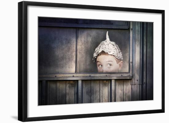 Boy in a Tin Foil Hat Peeking Out of a Window-soupstock-Framed Art Print