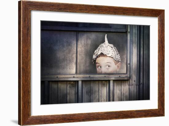 Boy in a Tin Foil Hat Peeking Out of a Window-soupstock-Framed Art Print