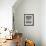 Boy Kicking a Football-Bettmann-Framed Photographic Print displayed on a wall