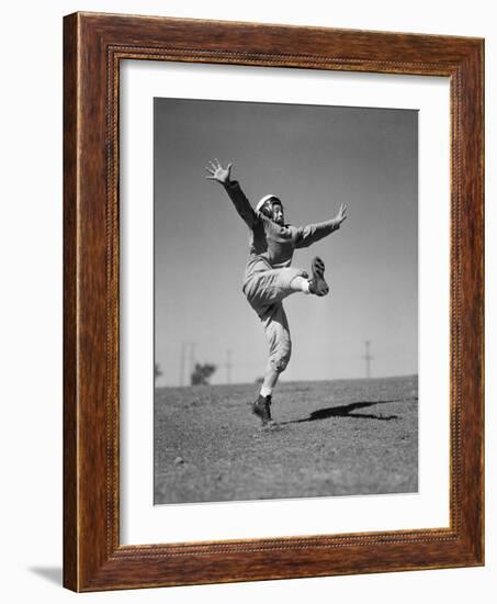 Boy Kicking a Football-Bettmann-Framed Photographic Print