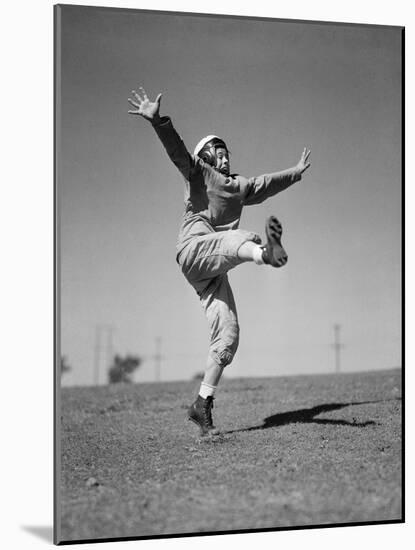 Boy Kicking a Football-Bettmann-Mounted Photographic Print