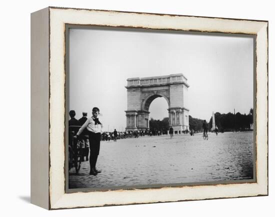 Boy on Bike as Hundreds Ride Bikes Through the Arch at Prospect Park During a Bicycle Parade-Wallace G^ Levison-Framed Premier Image Canvas