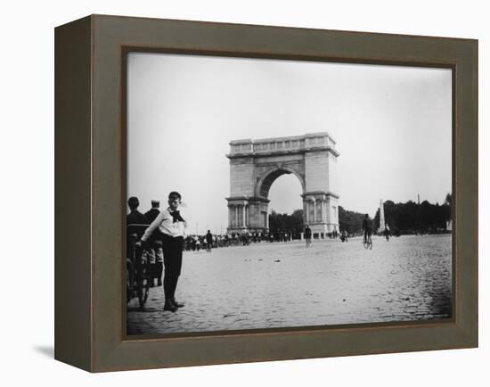 Boy on Bike as Hundreds Ride Bikes Through the Arch at Prospect Park During a Bicycle Parade-Wallace G^ Levison-Framed Premier Image Canvas