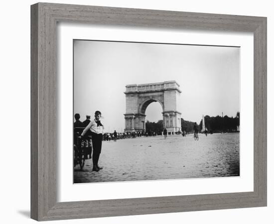 Boy on Bike as Hundreds Ride Bikes Through the Arch at Prospect Park During a Bicycle Parade-Wallace G^ Levison-Framed Photographic Print