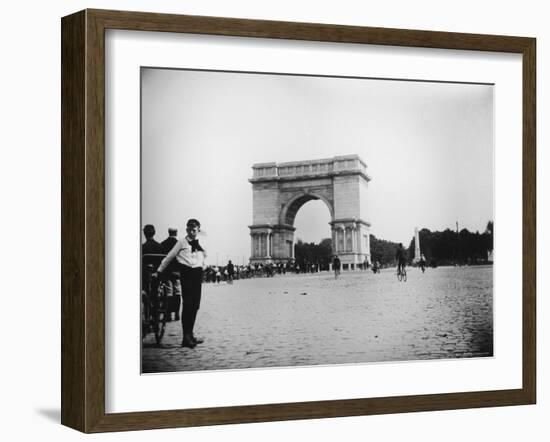 Boy on Bike as Hundreds Ride Bikes Through the Arch at Prospect Park During a Bicycle Parade-Wallace G^ Levison-Framed Photographic Print