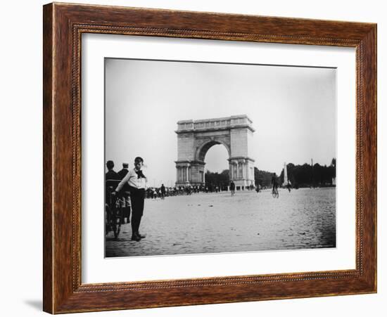 Boy on Bike as Hundreds Ride Bikes Through the Arch at Prospect Park During a Bicycle Parade-Wallace G^ Levison-Framed Photographic Print