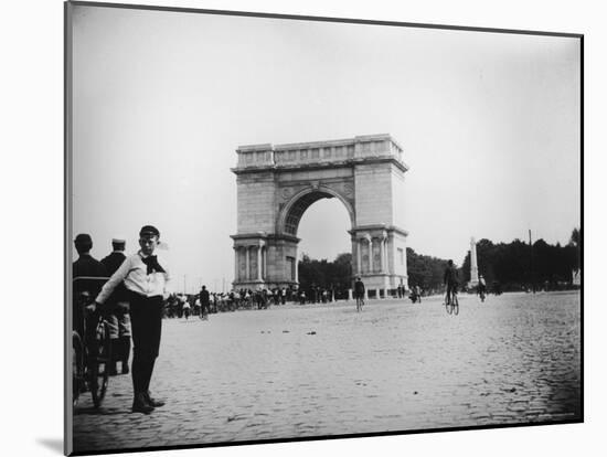 Boy on Bike as Hundreds Ride Bikes Through the Arch at Prospect Park During a Bicycle Parade-Wallace G^ Levison-Mounted Photographic Print