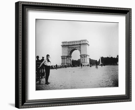 Boy on Bike as Hundreds Ride Bikes Through the Arch at Prospect Park During a Bicycle Parade-Wallace G^ Levison-Framed Photographic Print