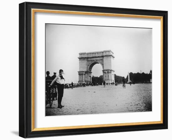 Boy on Bike as Hundreds Ride Bikes Through the Arch at Prospect Park During a Bicycle Parade-Wallace G^ Levison-Framed Photographic Print