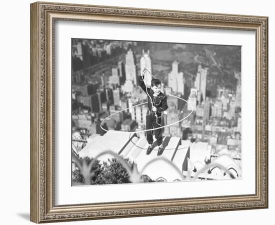 Boy on Ledge Twirling a Lasso-null-Framed Photographic Print