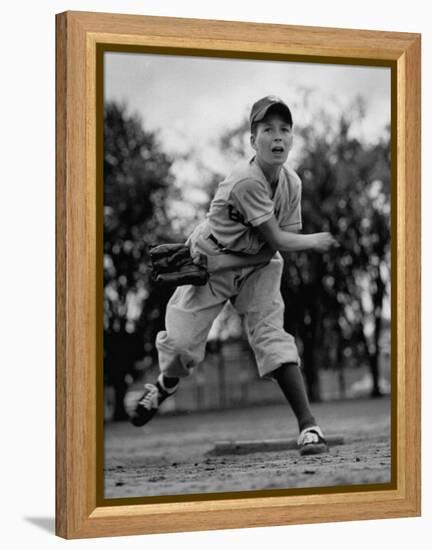 Boy Playing a Game of Little League Baseball-Yale Joel-Framed Premier Image Canvas