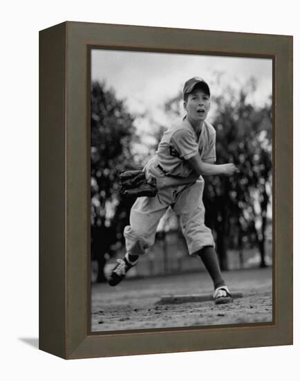 Boy Playing a Game of Little League Baseball-Yale Joel-Framed Premier Image Canvas