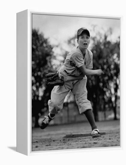 Boy Playing a Game of Little League Baseball-Yale Joel-Framed Premier Image Canvas