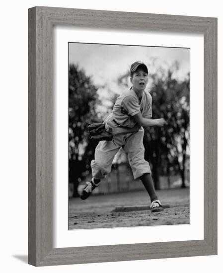 Boy Playing a Game of Little League Baseball-Yale Joel-Framed Photographic Print