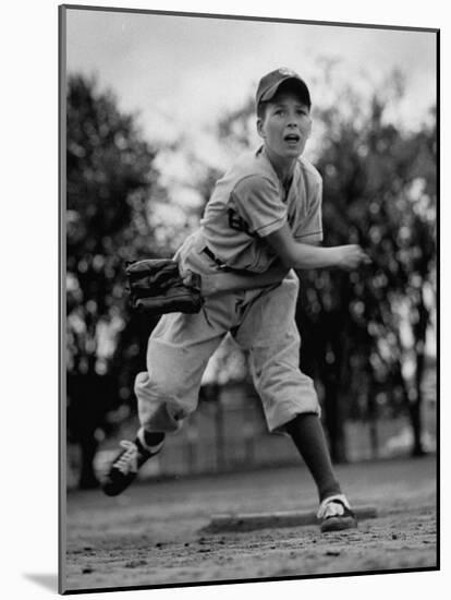 Boy Playing a Game of Little League Baseball-Yale Joel-Mounted Photographic Print