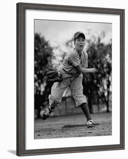 Boy Playing a Game of Little League Baseball-Yale Joel-Framed Photographic Print