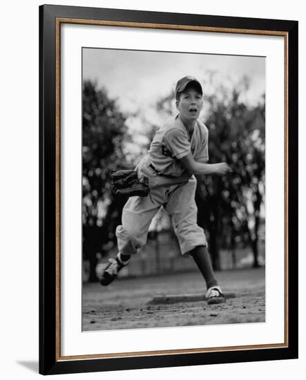 Boy Playing a Game of Little League Baseball-Yale Joel-Framed Photographic Print