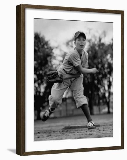 Boy Playing a Game of Little League Baseball-Yale Joel-Framed Photographic Print