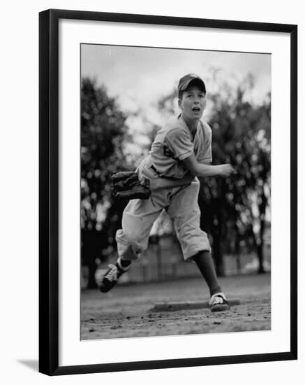 Boy Playing a Game of Little League Baseball-Yale Joel-Framed Photographic Print